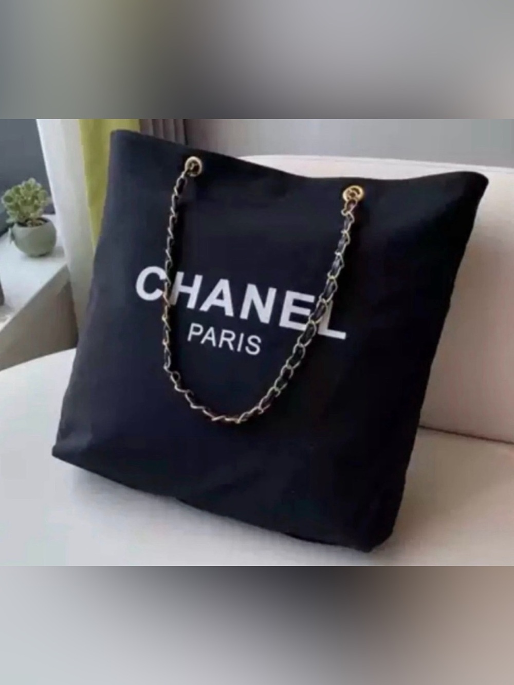 Paris tote with gold chain.